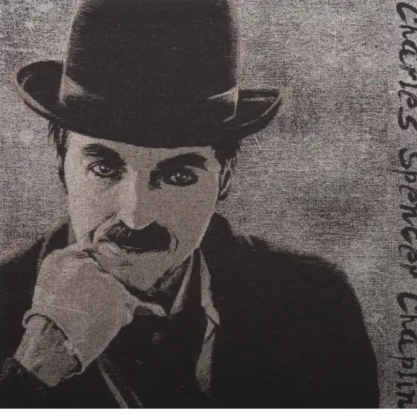 Charles Spencer Chaplin Couch Pillow | Close Up 1